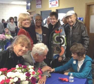 BI-PARTISAN SUPPORT — More than 100 people came to honor former Assemblywoman Vivian Freeman's legacy at WashoeDEMS headquarters on January 18, including (standing from left) longtime activist and celebration co-chair Mylan Hawkins, former State Sen. Bernice Mathews, D-Reno, top gun attorney Margo Piscevich, and former Washoe County Assessor and Truckee Meadows Democratic Alliance Chairman Bob McGowan, D. Seated (l to r) artist Renate Neumann, top gun attorney Peter Chase Neumann and former Nevada Lt. Governor Sue Wagner, R.